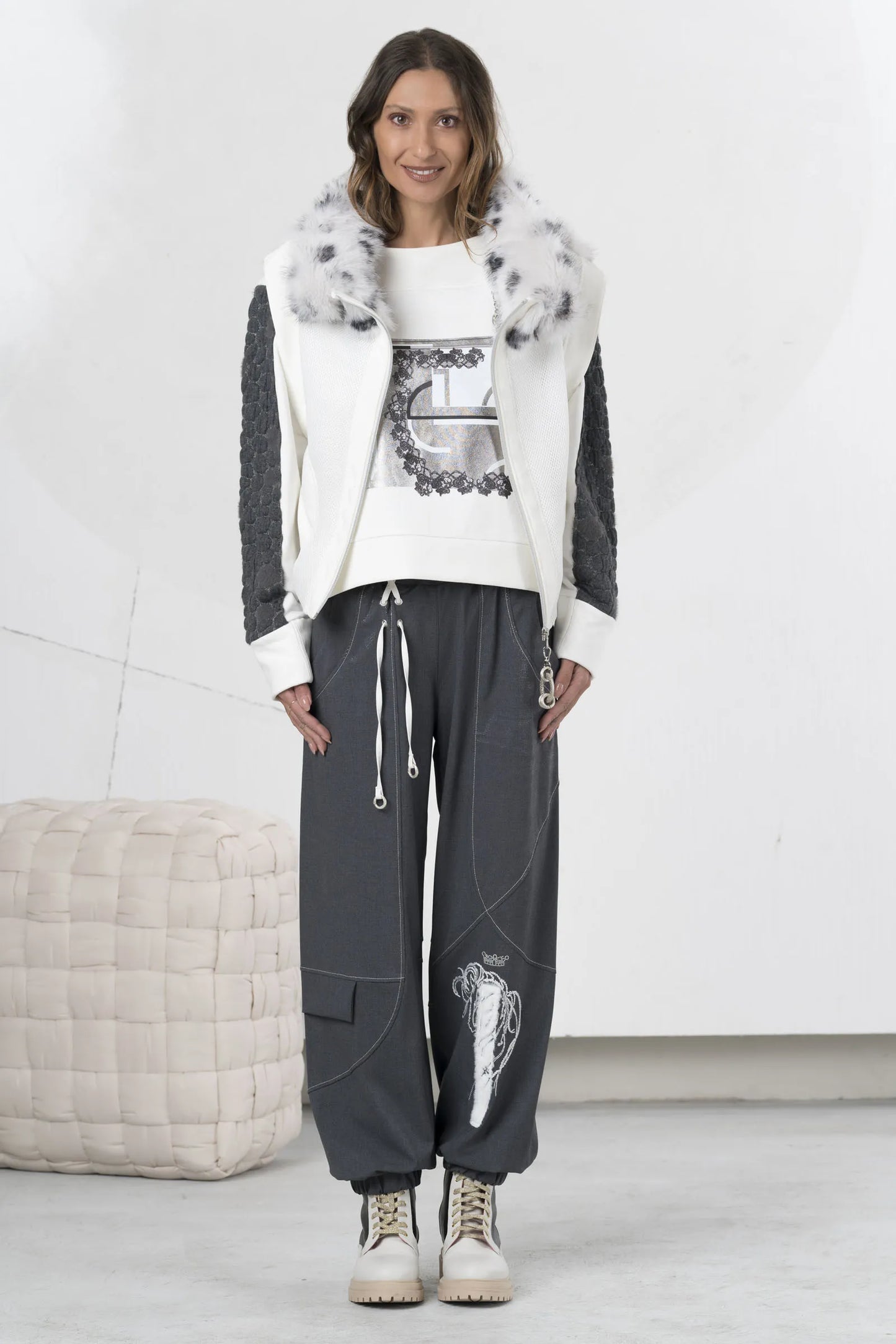 Padded vest with white and charcoal gray spotted faux 23126