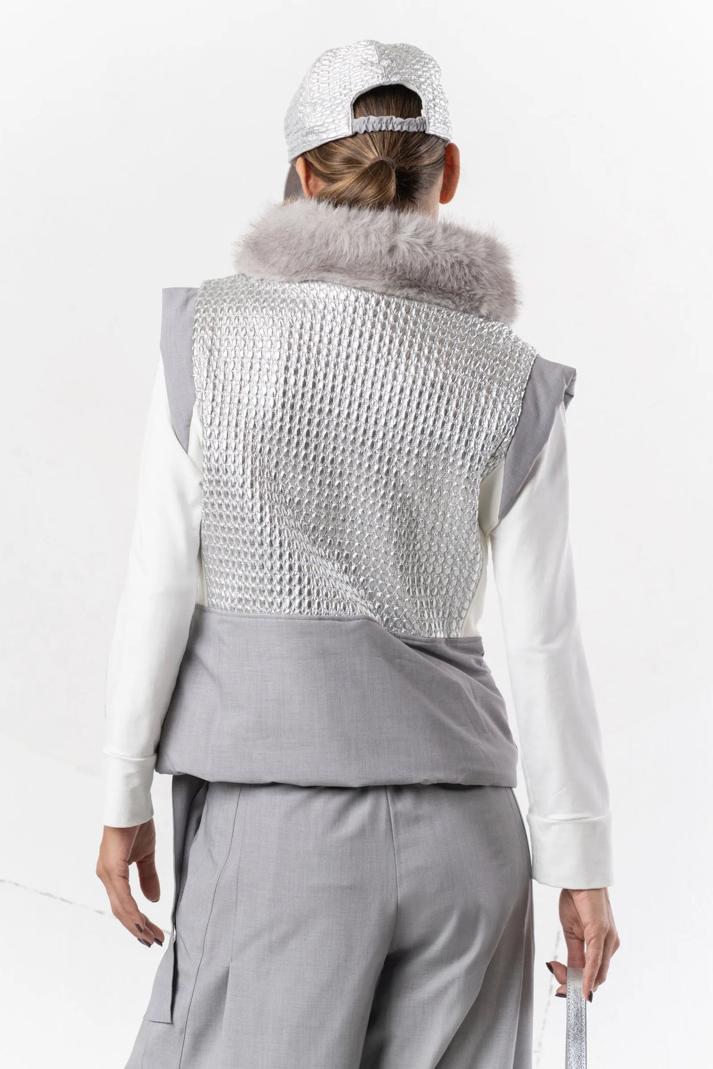 Gray and silver quilted padded vest