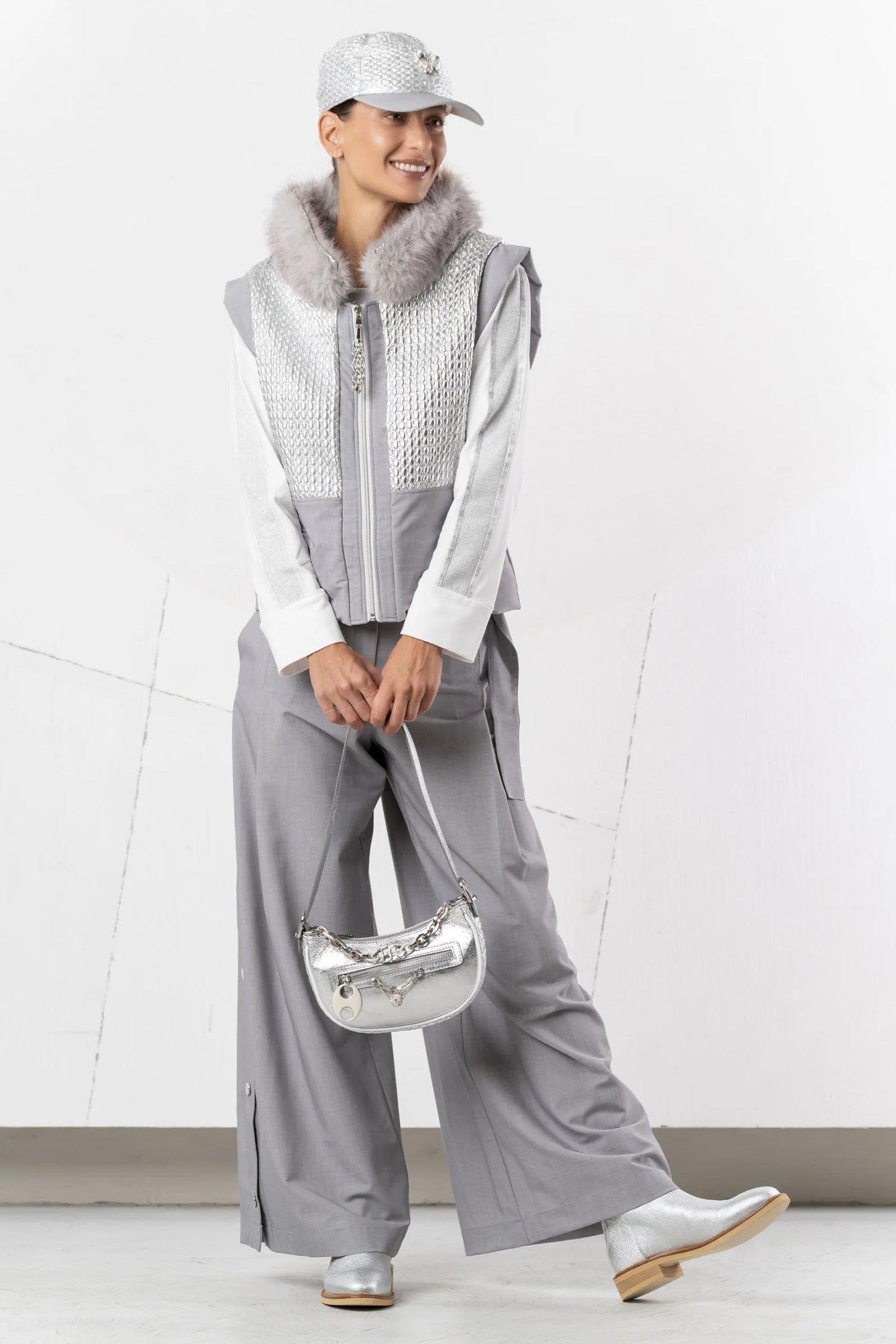 Gray and silver quilted padded vest